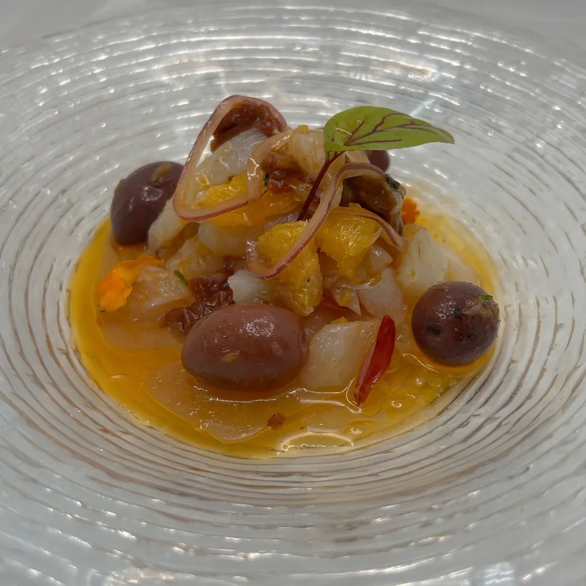 Esqueixada de bacalao con naranja y olivas en La Estrella 1924